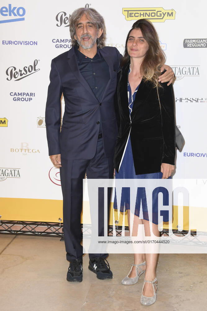 Sergio Rubini (left) and Carla Cavalluzzi (right) attend at the red carpet of the Globo d oro award 2022 at the Auditorium Parco Della Musica. Rome Italy - ZUMAs197 20221004_zaa_s197_451