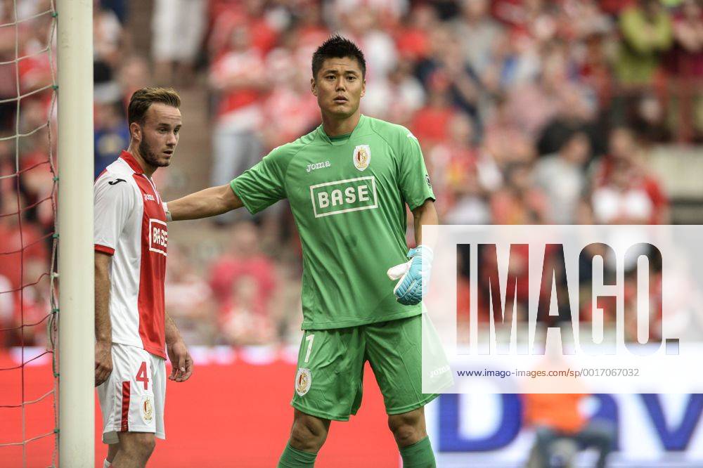 20140725 - LIEGE, BELGIUM: Standard d Francois Marquet and Standard s goalkeeper Eiji Kawashima pictured during the Jupiler Pro League match between Standard de Liege and RSC Charleroi, in Liege, Friday 25 July 2014, on day 1 of the Belgian soccer championship. JASPERxJACOBS 04264437