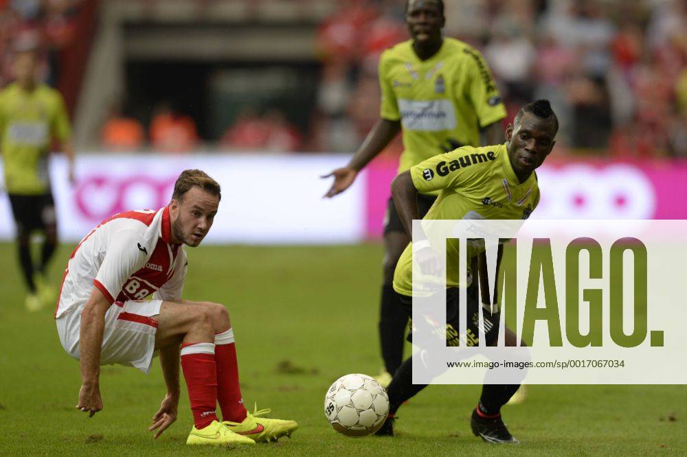 20140725 - LIEGE, BELGIUM: Standard d Francois Marquet and Charleroi s Lynel Kitambala pictured in action during the Jupiler Pro League match between Standard de Liege and RSC Charleroi, in Liege, Friday 25 July 2014, on day 1 of the Belgian soccer championship. JASPERxJACOBS 04264439