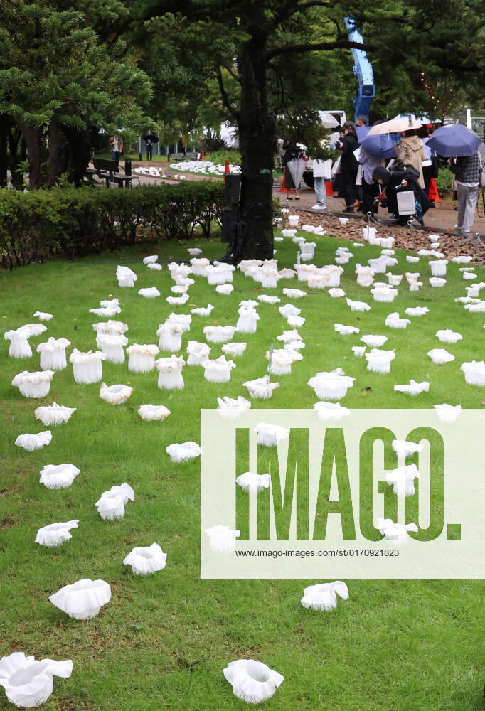 Tokyo, Japan - An installation as it is. -equilibrium flower- of some 2,000 flower like objects with small LED lights is displayed at a park of the Tokyo Midtown as a part of the Tokyo Midtown Design Touch 2022 in Tokyo on Friday, October 14, 2022. An annual design event with the theme of Design for Sustainable Future started at the Tokyo Midtown through November 3. , aflo_201255378.jpg,