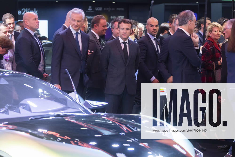Paris, France October 17, 2022 - Paris Motor Show - France s President Emmanuel Macron, Minister for the Economy and Finances Bruno Le Maire ECONOMIE, SALON DE L AUTO, AUTOMOBILE