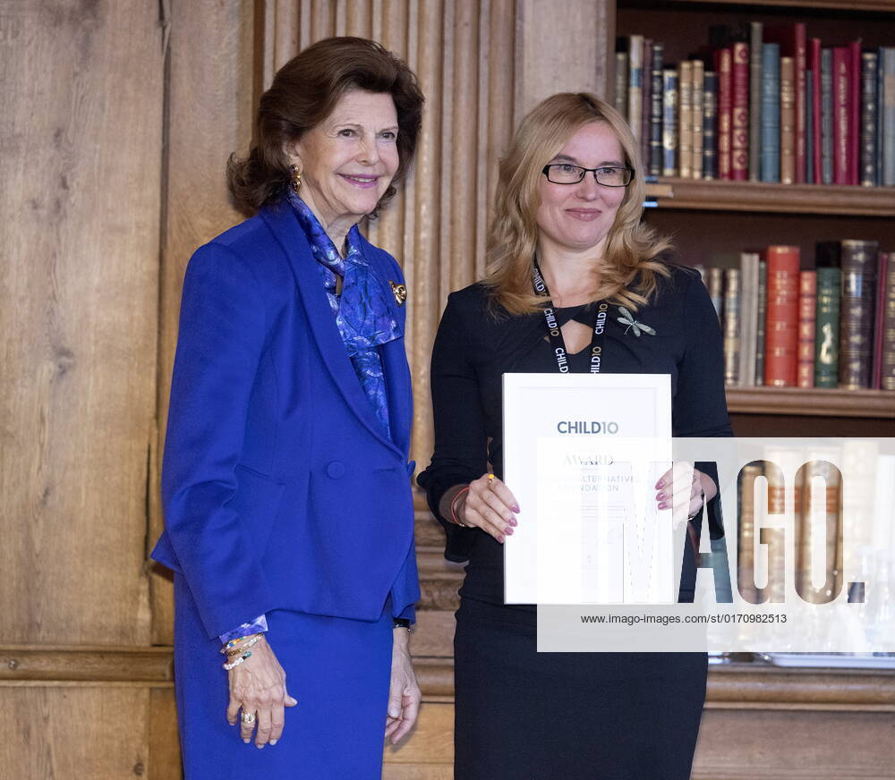 STOCKHOLM 20221018 Milena Kadieva Vladimirova from the Bulgarian organization Gender Alternatives Foundation receives an award from Queen Silvia during the Child10 award ceremony in the Bernadotte Library at Stockholm Palace STOCKHOLM SWEDEN