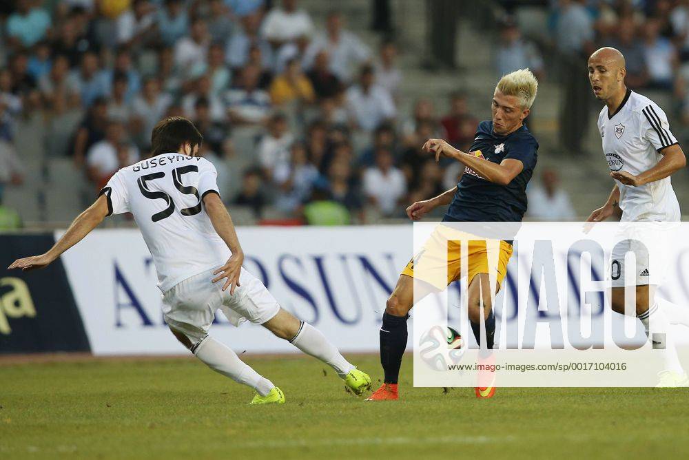 SOCCER - CL, Karabag vs RBS BAKU,AZERBAIJAN,30.JUL.14 - SOCCER - UEFA Champions League, qualifying, Karabag Agdam FK vs Red Bull Salzburg. Image shows Badavi Guseynov (Karabag) and Kevin Kampl (RBS).