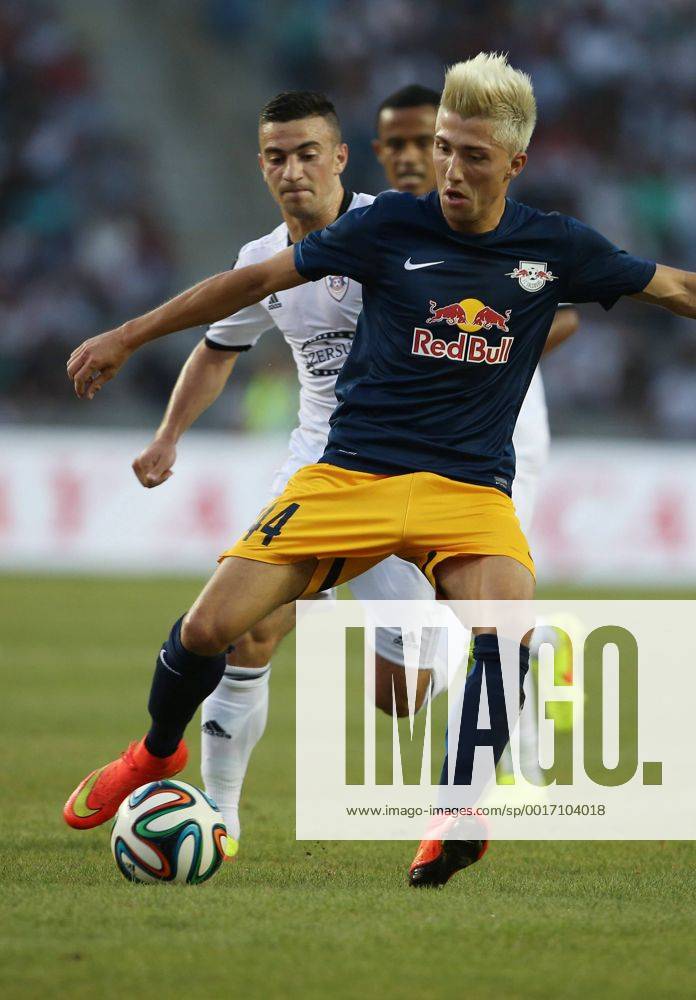 SOCCER - CL, Karabag vs RBS BAKU,AZERBAIJAN,30.JUL.14 - SOCCER - UEFA Champions League, qualifying, Karabag Agdam FK vs Red Bull Salzburg. Image shows Kevin Kampl (RBS) and Gara Garayev (Karabag).