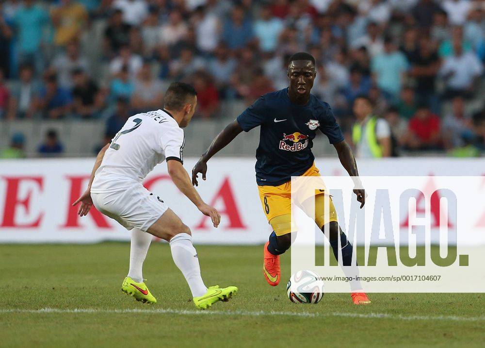 SOCCER - CL, Qarabag vs RBS BAKU,AZERBAIJAN,30.JUL.14 - SOCCER - UEFA Champions League, qualifying, Qarabag Agdam FK vs Red Bull Salzburg. Image shows Qara Qarayev (Qarabag) and Naby Keita (RBS).