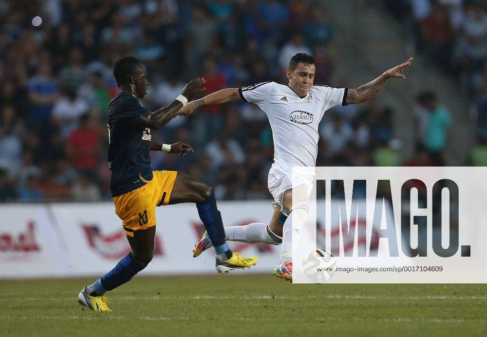 SOCCER - CL, Qarabag vs RBS BAKU,AZERBAIJAN,30.JUL.14 - SOCCER - UEFA Champions League, qualifying, Qarabag Agdam FK vs Red Bull Salzburg. Image shows Sadio Mane (RBS) and Reynaldo (Qarabag).