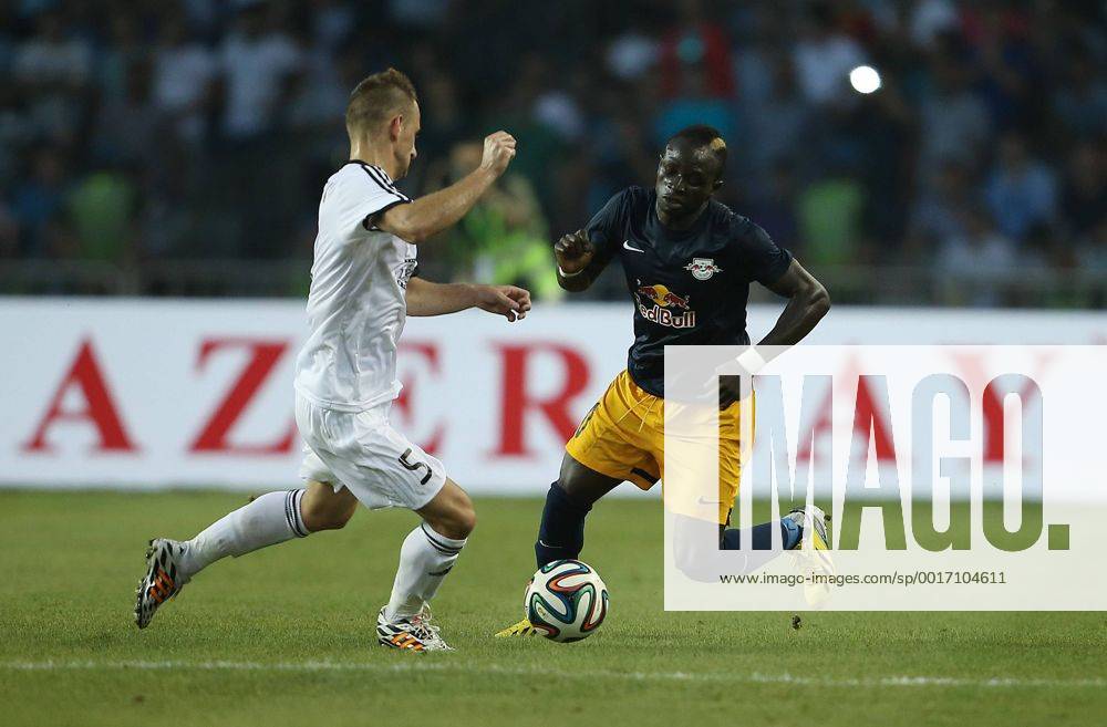 SOCCER - CL, Qarabag vs RBS BAKU,AZERBAIJAN,30.JUL.14 - SOCCER - UEFA Champions League, qualifying, Qarabag Agdam FK vs Red Bull Salzburg. Image shows Maksim Medvedev (Qarabag) and Sadio Mane (RBS).