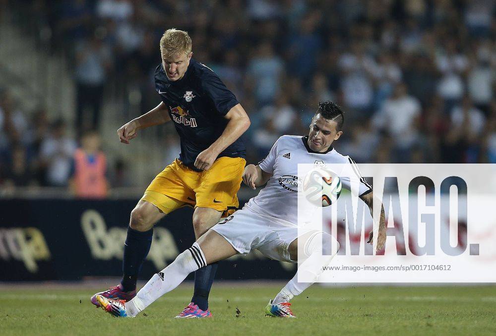 SOCCER - CL, Qarabag vs RBS BAKU,AZERBAIJAN,30.JUL.14 - SOCCER - UEFA Champions League, qualifying, Qarabag Agdam FK vs Red Bull Salzburg. Image shows Martin Hinteregger (RBS) and Reynaldo (Qarabag).