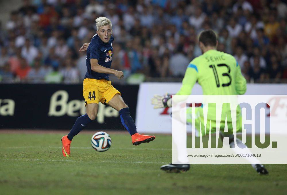 SOCCER - CL, Qarabag vs RBS BAKU,AZERBAIJAN,30.JUL.14 - SOCCER - UEFA Champions League, qualifying, Qarabag Agdam FK vs Red Bull Salzburg. Image shows Kevin Kampl (RBS) and Ibrahim Sehic (Qarabag).