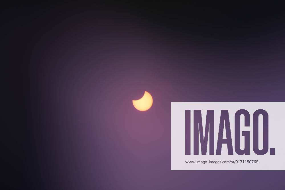Picture shows a view of the moon partially obscuring the sun disk, This picture taken on October 25, 2022 shows a view of the moon partially obscuring the sun disk, seen behind an X-ray image as a filter, during a partial solar eclipse visible from Gaza City in the Palestinian Gaza Strip enclave. Photo by Ashraf Amra apaimages Gaza city Gaza Strip Palestinian Territory 251022_Gaza_ASH_3_00 (12)