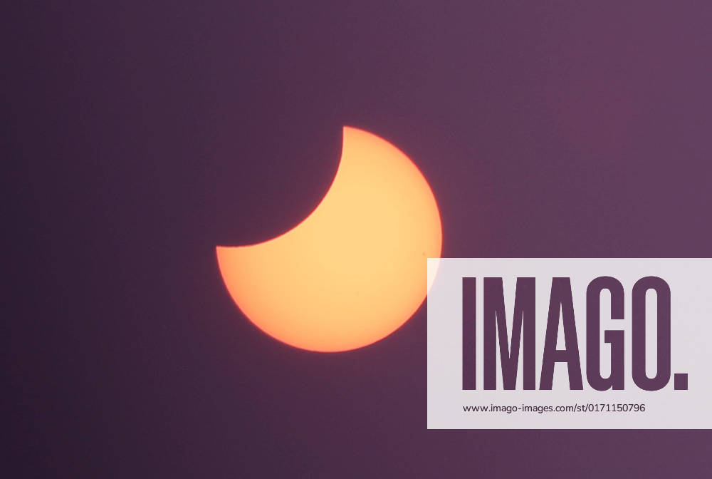 Picture shows a view of the moon partially obscuring the sun disk, This picture taken on October 25, 2022 shows a view of the moon partially obscuring the sun disk, seen behind an X-ray image as a filter, during a partial solar eclipse visible from Gaza City in the Palestinian Gaza Strip enclave. Photo by Ashraf Amra apaimages Gaza city Gaza Strip Palestinian Territory 251022_Gaza_ASH_3_00 (9)