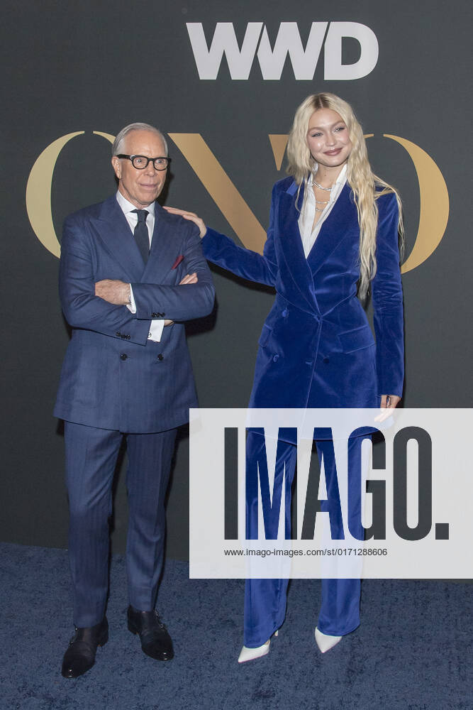 Tommy Hilfiger and Gigi Hadid attend 2022 WWD Honors at Cipriani South Street in New York City. New York United States - ZUMAs197 20221025_zaa_s197_352