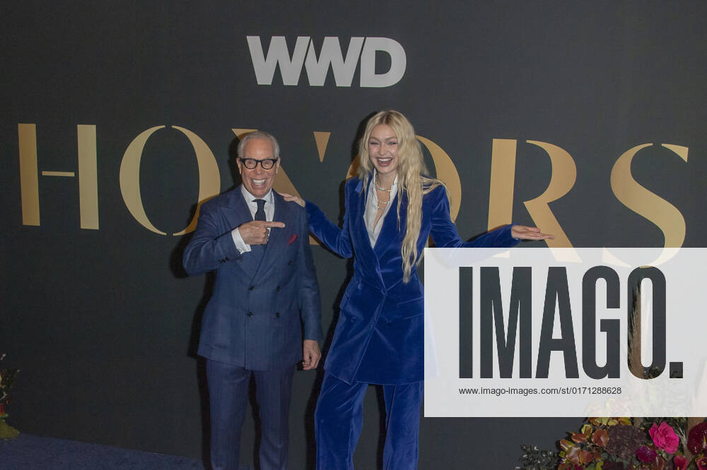 Tommy Hilfiger and Gigi Hadid attend 2022 WWD Honors at Cipriani South Street in New York City. New York United States - ZUMAs197 20221025_zaa_s197_349