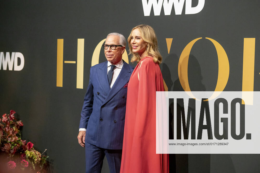 Tommy Hilfiger and Dee Ocleppo Hilfiger attend the 2022 WWD Honors at Cipriani South Street in New York City. New York United States - ZUMAs197 20221025_zaa_s197_279