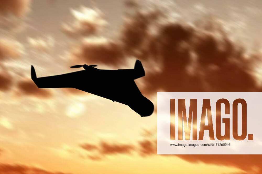 Ukraine: Military drone with bomb and rocket Silhouette of an Iranian military unmanned aerial vehicle at sunset. Combat drone. Illustrative photo Ukraine