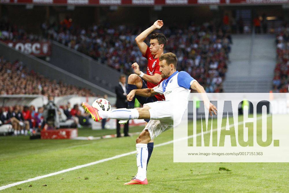 Sebastien Corchia (Lille) vs Daniel Pavlovic (Grasshopper Zurich) FOOTBALL : OSC Lille vs Grasshopper Club Zürich - Champions League, third qualifying round - 05 08 2014 GwendolineLeGoff