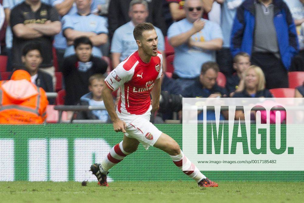 Arsenal s Aaron Ramsey celebrates scoring his sides second goal - Arsenal vs. Manchester City - The FA Community Shield - Wembley Stadium - London - 10 08 2014 Pic Philip Oldham Sportimage .