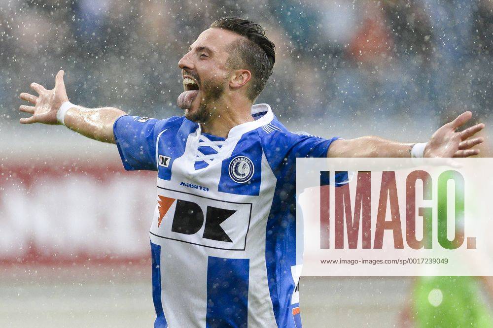 20140817 - GENT, BELGIUM: Gent s Danijel Milicevic celebrates after scoring during the Jupiler Pro League match between KAA Gent and Zulte Waregem, in Gent, Sunday 17 August 2014, on day 4 of the Belgian soccer championship. LAURIExDIEFFEMBACQ 04280373