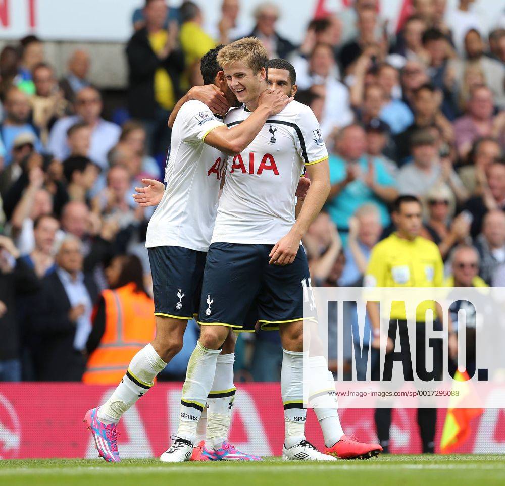 Tottenham s Nacer Chadli celebrates scoring his sides third goal with Eric Dier - Barclays Premier League - Tottenham vs Queens Park Rangers - White Hart Lane - London - England - 24th August 2014 - Picture David Klein Sportimage .