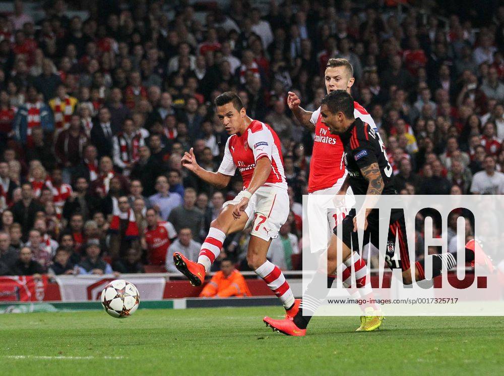 Arsenal s Alexis Sanchez scoring his sides opening goal - UEFA Champions League, Play-off Second Leg - Emirates Stadium - England - 27th August 2014 - Picture David Klein Sportimage .