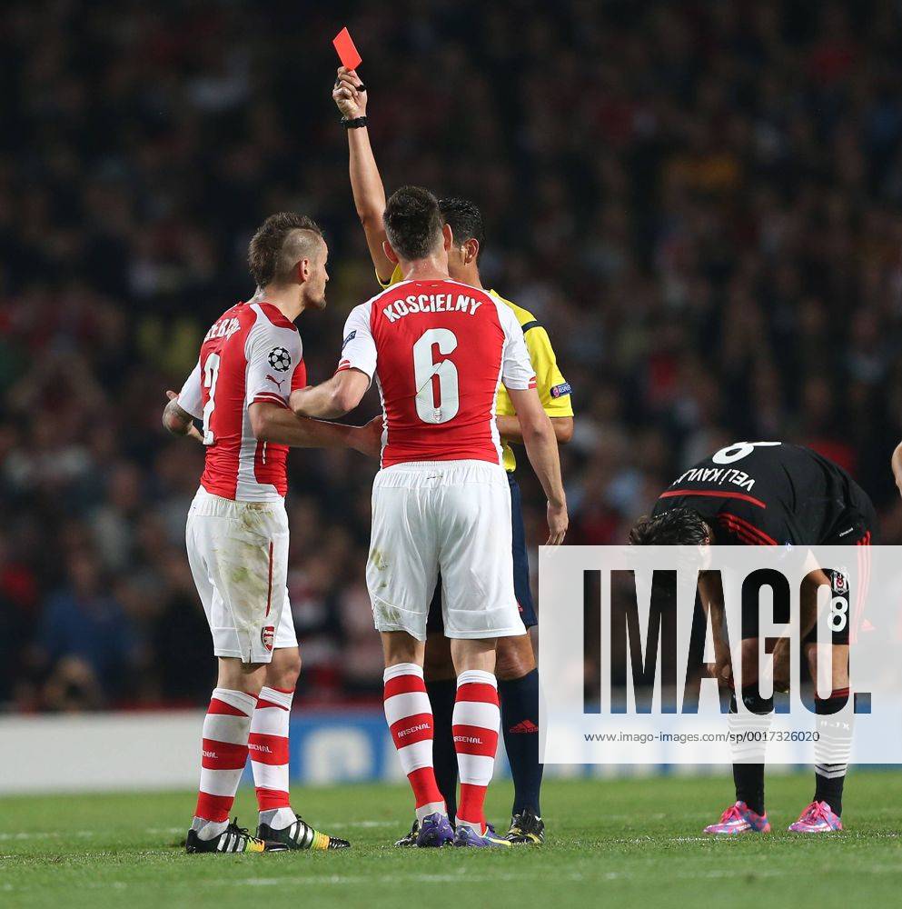 Arsenal s Mathieu Debuchy gets sent off for this tackle on Besiktas Mustafa Pektemek - UEFA Champions League, Play-off Second Leg - Emirates Stadium - England - 27th August 2014 - Picture David Klein Sportimage .