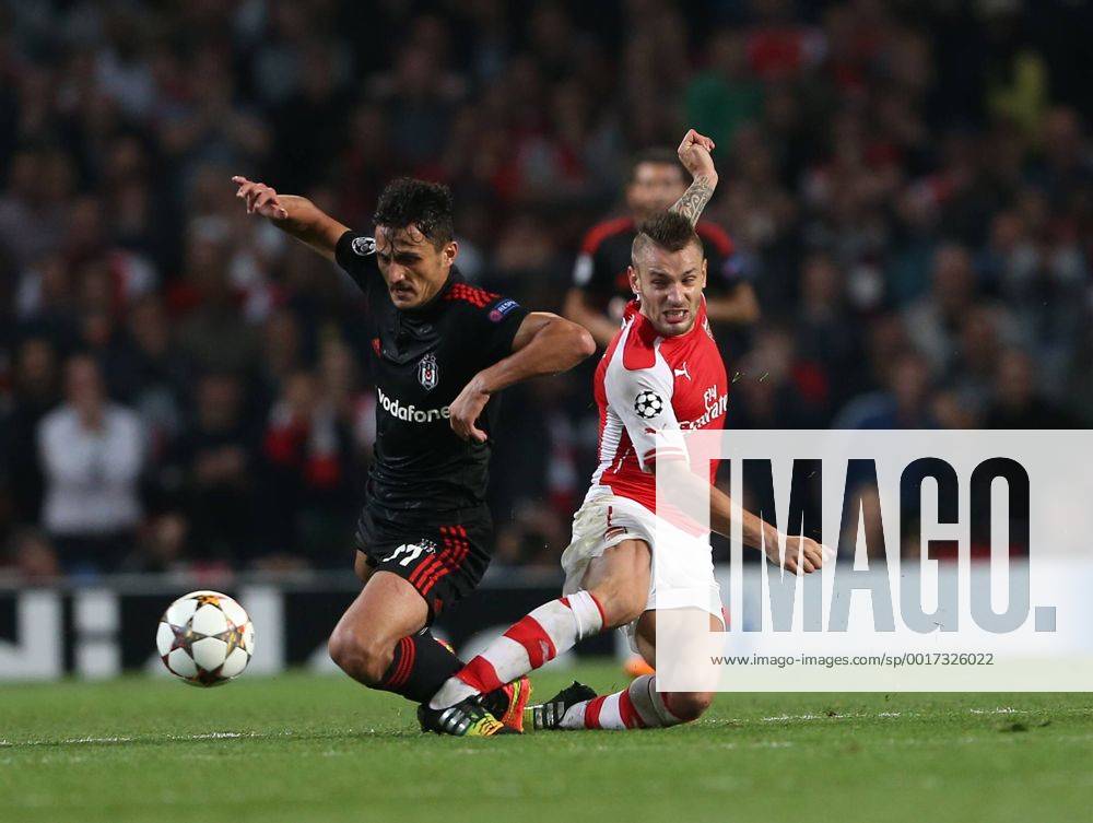 Arsenal s Mathieu Debuchy gets sent off for this tackle on Besiktas Mustafa Pektemek - UEFA Champions League, Play-off Second Leg - Emirates Stadium - England - 27th August 2014 - Picture David Klein Sportimage .