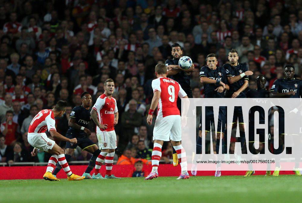 Arsenal s Alexis Sanchez scoring his sides opening goal - Capital One Cup - Arsenal FC London vs FC Southampton .