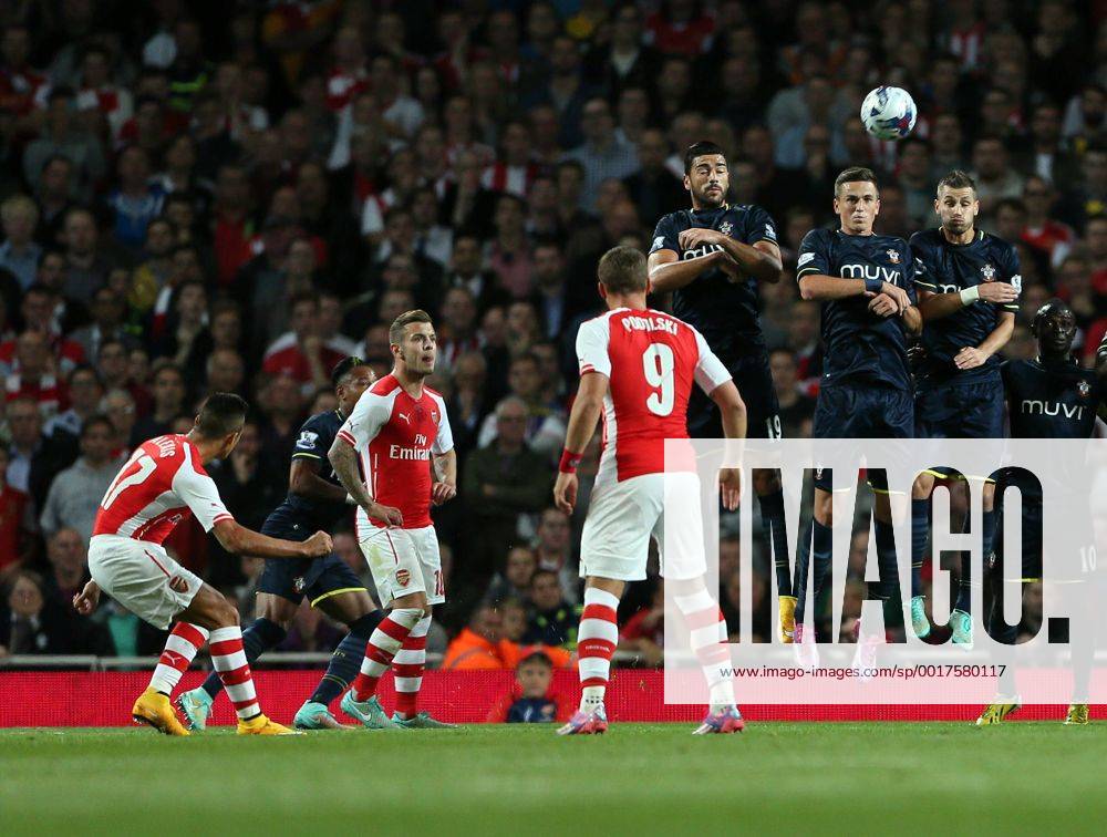 Arsenal s Alexis Sanchez scoring his sides opening goal - Capital One Cup - Arsenal FC London vs FC Southampton .