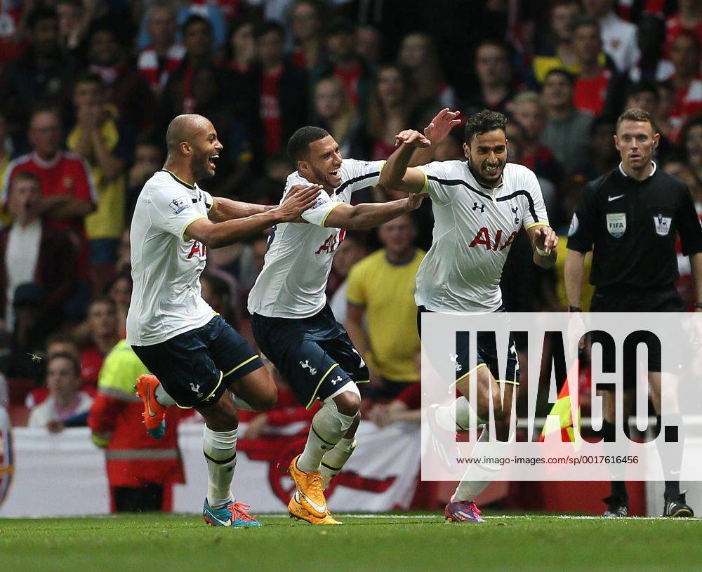 Tottenham s Nacer Chadli celebrates scoring his sides opening goal - Barclays Premier League - Arsenal vs Tottenham Hotspur - Emirates Stadium - England - 27th September 2014 - .