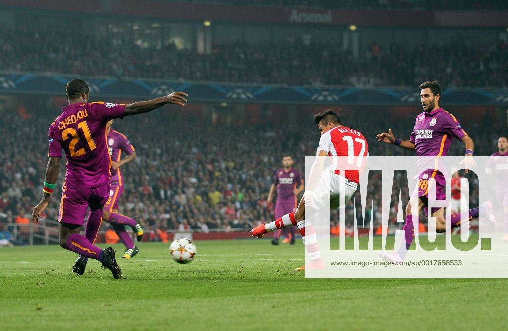Arsenal s Alexis Sanchez scoring his sides third goal - UEFA Champions League Group D - Arsenal vs Galatasaray - Emirates Stadium - England - 01st October 2014 - Picture David Klein Sportimage .