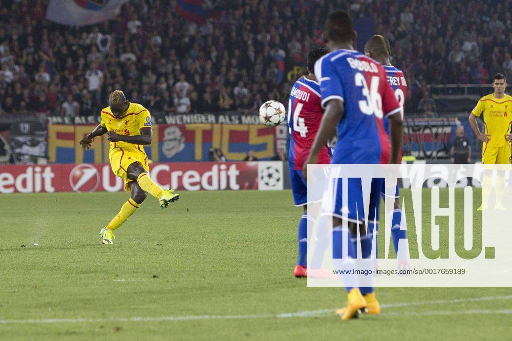 Mario Balotelli of Liverpool fires a shot at goal - FC Basel vs. Liverpool - UEFA Champions League - St Jakobs Park - Basel - 01 10 2014 Pic Philip Oldham Sportimage .