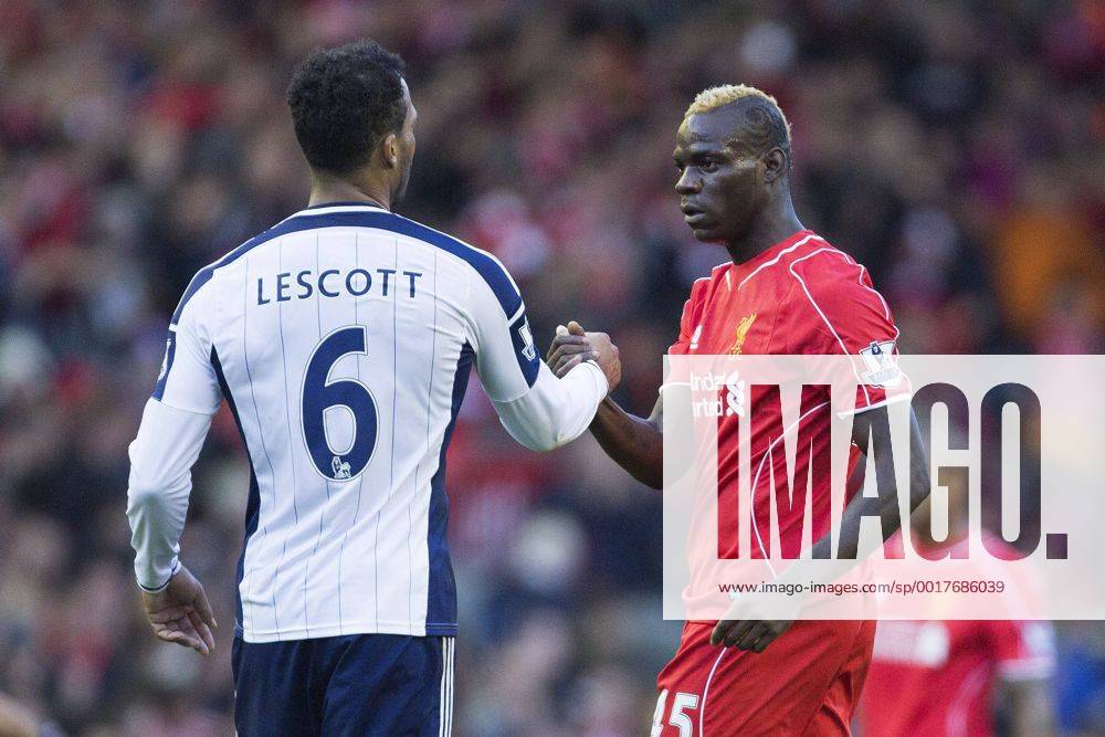 West Brom s Joleon Loscott congratulates Mario Balotelli of Liverpool at full time - Liverpool FC vs. West Bromwich Albion - Barclay s Premier League - Anfield - Liverpool - 04 10 2014 Pic PhilipxOldham Sportimage .
