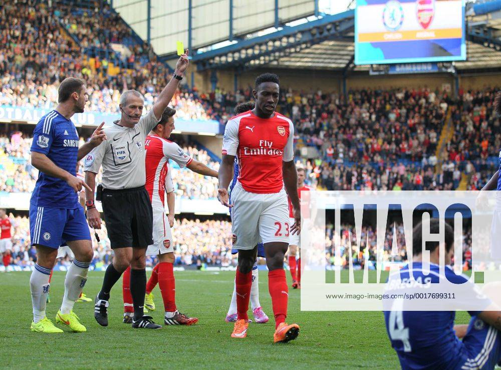 Arsenal s Danny Welbeck goes in with studs up on Chelsea s Cesc Fabregas but is only booked - Barclays Premier League - Chelsea Vs Arsenal - Stamford Bridge - England - 5th October 2014 - .