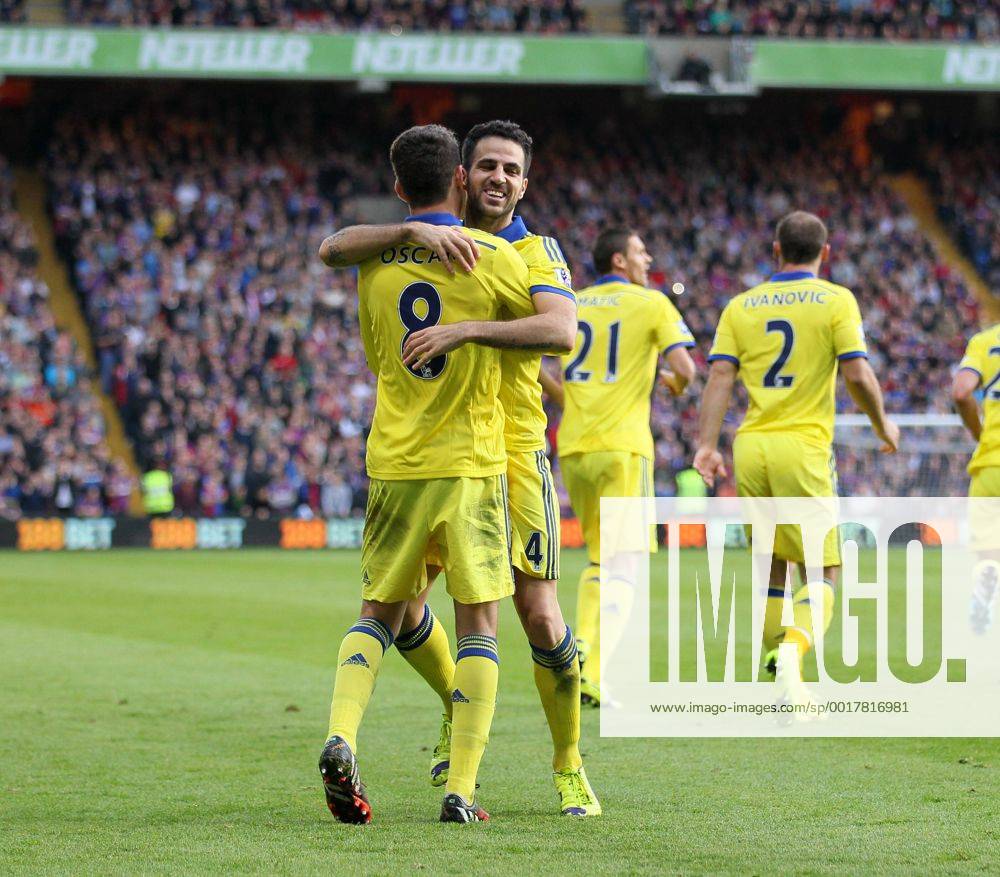 Chelsea s Cesc Fabregas celebrates scoring his sides second goal with Oscar - Barclays Premier League - Crystal Palace vs Chelsea - Selhurst Park - England - 18th October 2014 - Picture David Klein Sportimage .