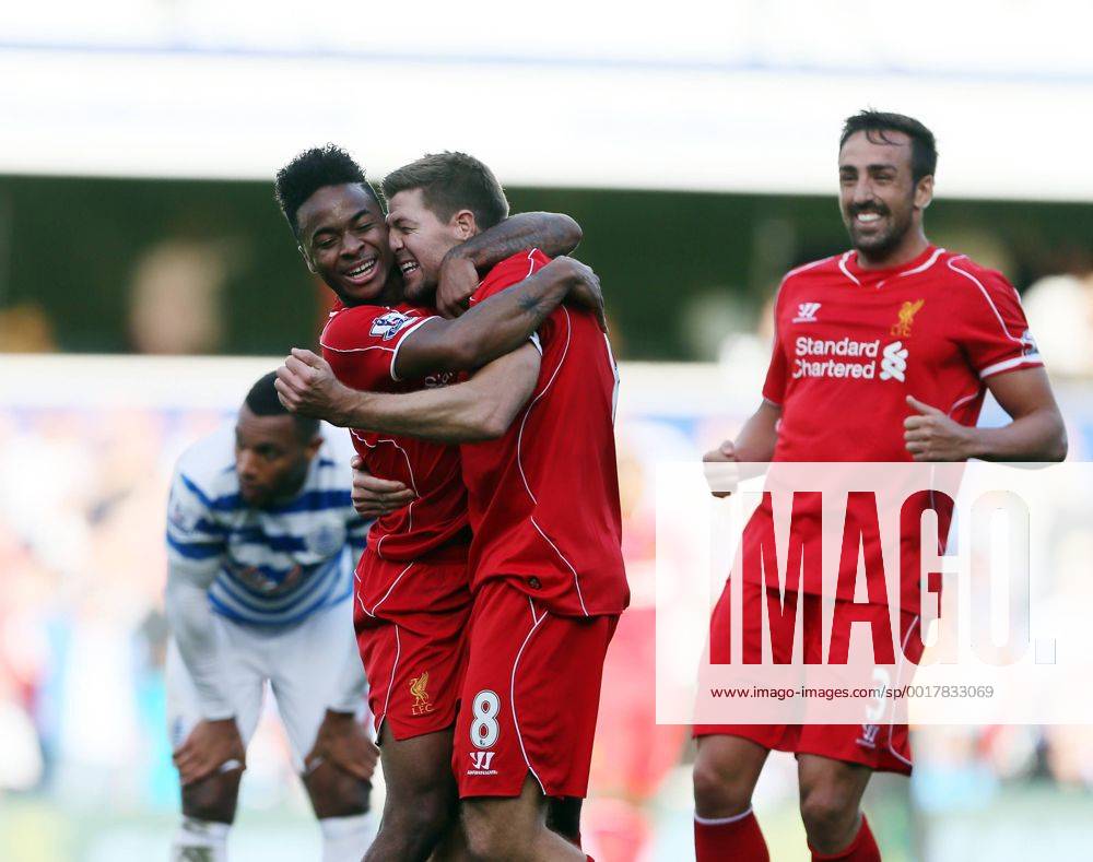 Liverpool s Raheem Sterling celebrates his sides winning goal with Steven Gerrard - Barclays Premier League - QPR vs Liverpool - Loftus Road - England - 19th October 2014 - Picture David Klein Sportimage .