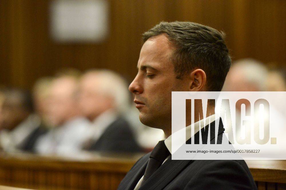 BY COURT ORDER, THIS IMAGE IS FREE TO USE. PRETORIA, SOUTH AFRICA - OCTOBER 21: Oscar Pistorius stands as he listens to his judgement in the Pretoria High Court on October 21, 2014, in Pretoria, South Africa. Judge Thokozile Masipa handed down her sentence today. Pistorius was sentenced to five years in prison. (Photo by Gallo Images Foto24 Herman Verwey) Oscar Pistorius Murder Trial XKL03