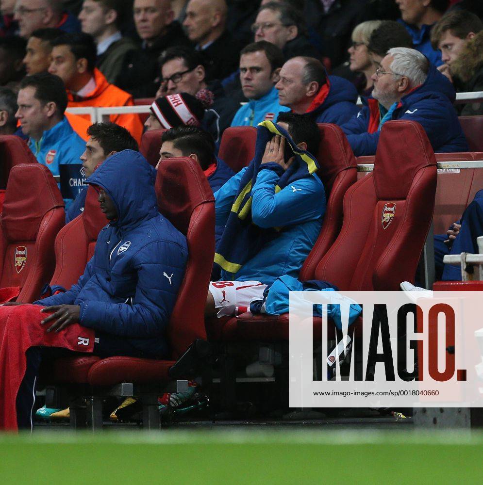 Arsenal s Mikel Arteta looks on dejected after going off injured - Champions League Group D - Arsenal vs Anderlecht- Emirates Stadium - London - England - 4th November 2014 - Picture David Klein Sportimage .