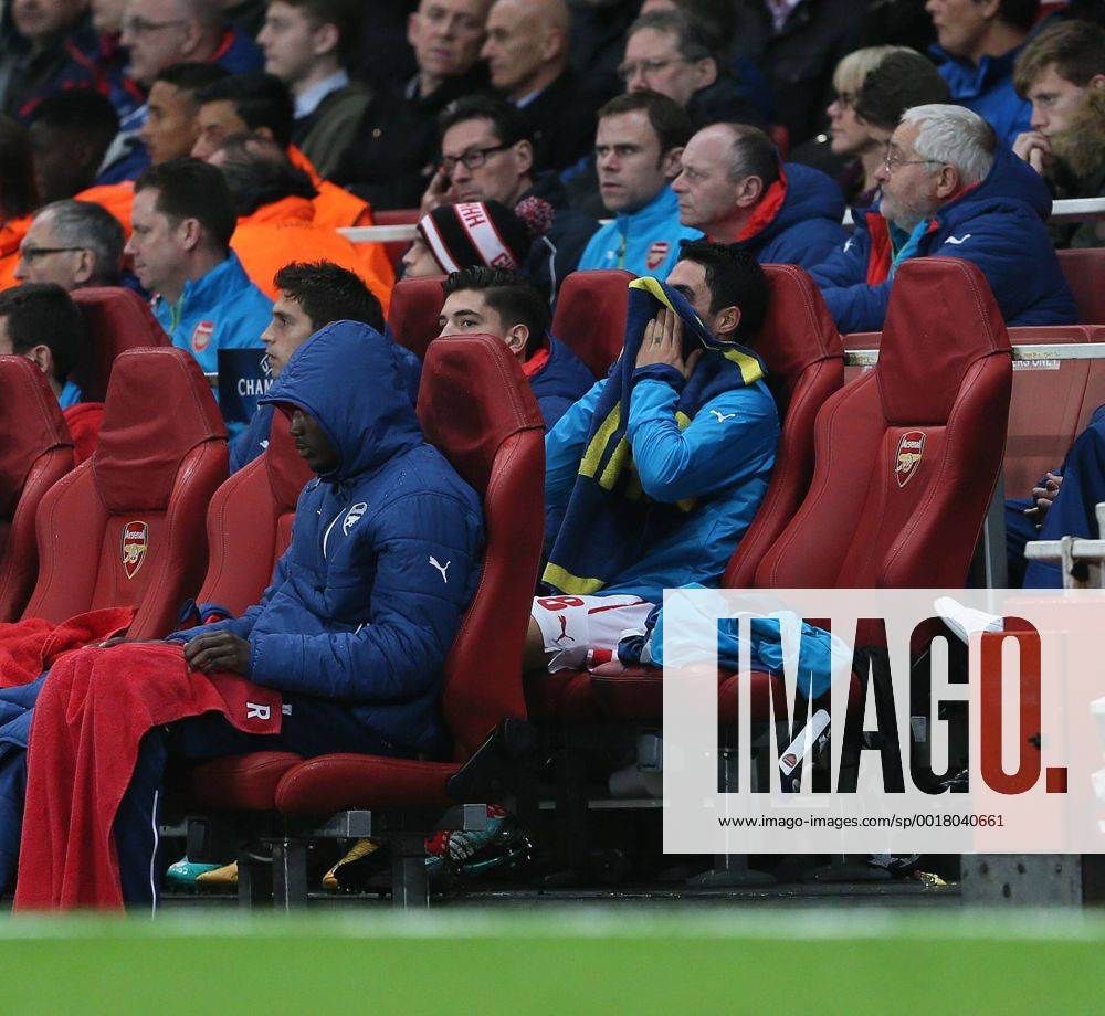 Arsenal s Mikel Arteta looks on dejected after going off injured - Champions League Group D - Arsenal vs Anderlecht- Emirates Stadium - London - England - 4th November 2014 - Picture David Klein Sportimage .