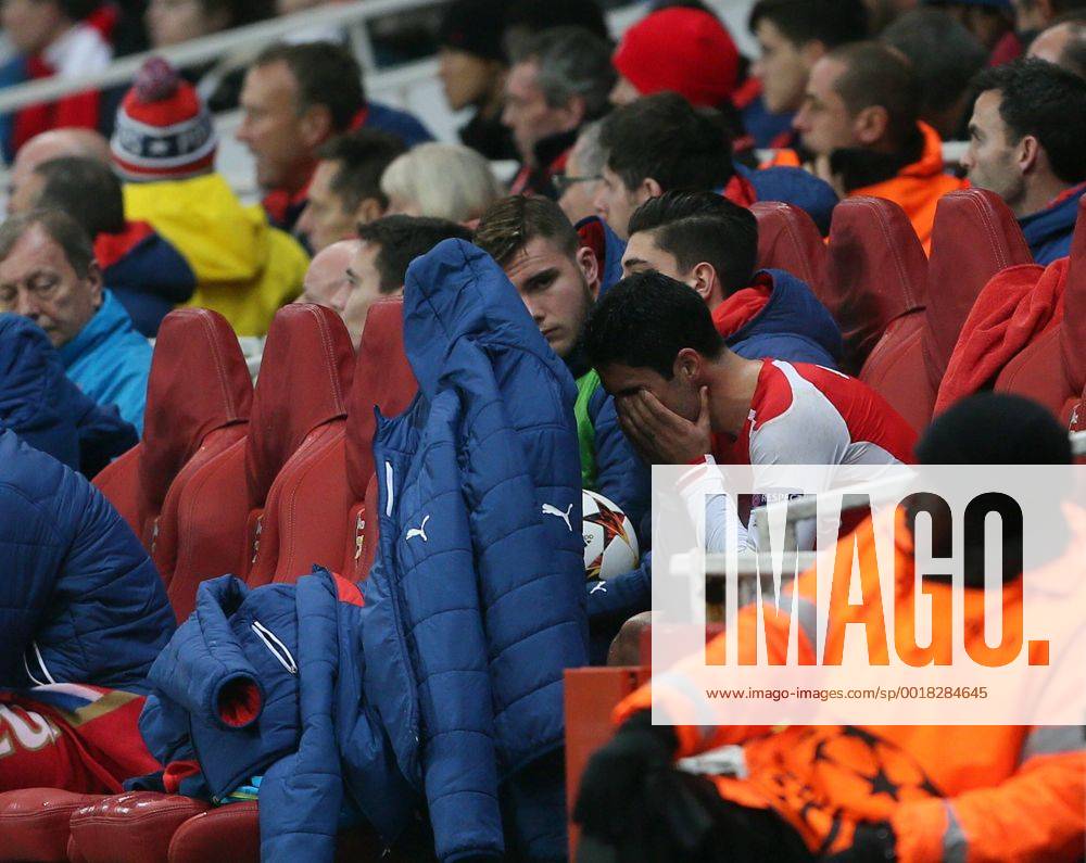 Arsenal s Mikel Arteta looks on dejected after getting injured again UEFA Champions League- Arsenal vs Borussia Dortmund- Emirates Stadium - England - 26th November 2014 - .