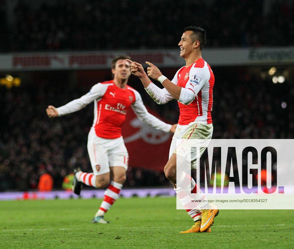 Aktuell Fußball, England, Premier League, FC Arsenal - FC Southampton Arsenal s Alexis Sanchez celebrates scoring his sides opening goal Barclays Premier League- Arsenal vs Southampton - Emirates Stadium - England - 3rd December 2014 - Picture David Klein Sportimage .