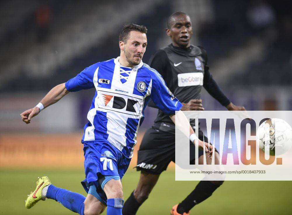 - GENT, BELGIUM: Gent s Danijel Milicevic and Genk s Ngongca Anele fight for the ball during the Jupiler Pro League match between KAA Gent and KRC Genk, in Gent, Sunday 07 December 2014, on day 18 of the Belgian soccer championship. JOHNxTHYS x04516915x