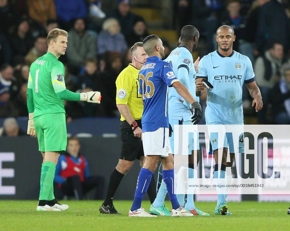 Vincent Kompany of Manchester City hands over the captains armband as he goes off injured during the second half - Barclays Premier League - Leicester City vs Manchester City - King Power Stadium - Leicester - England - 13th December 2014 - .