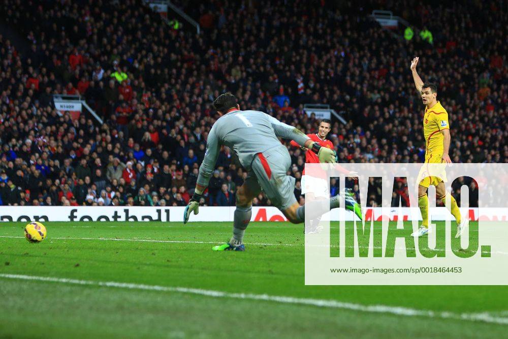 Robin van Persie of Manchester United ManU scores his sides third goal - Manchester United vs. Liverpool - Barclay s Premier League - Old Trafford - Manchester - 14 12 2014 Pic Philip Oldham Sportimage .