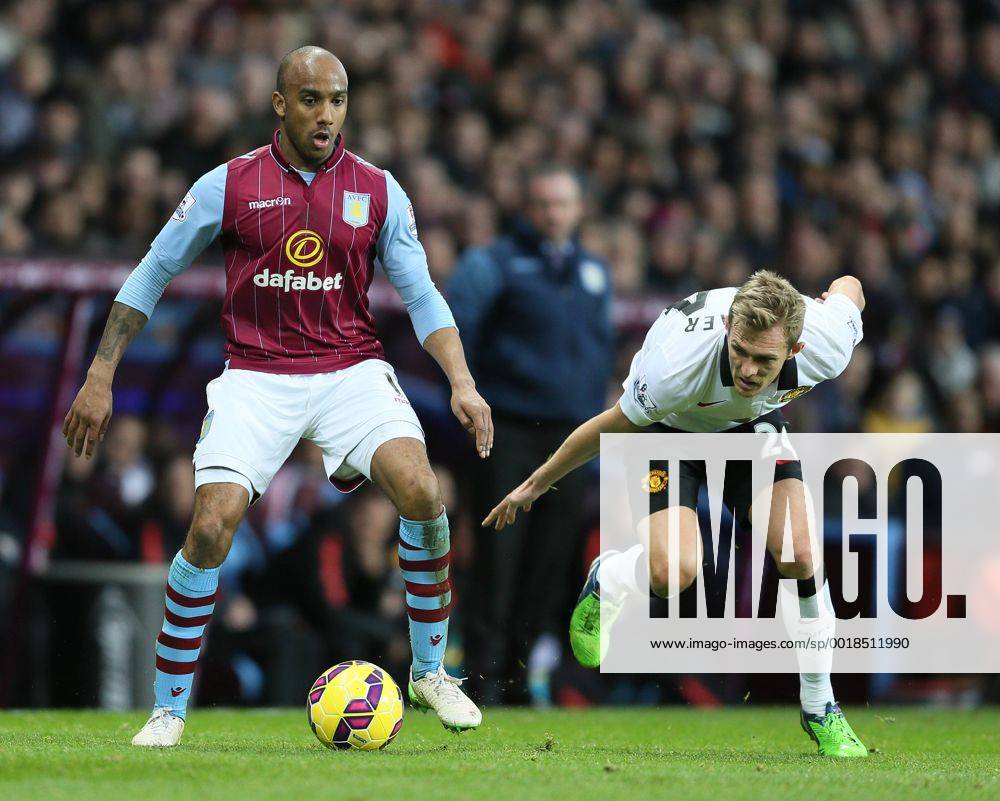 Fabian Delph of Aston Villa holds off Darren Fletcher of Manchester United ManU - Barclays Premier League - Aston Villa vs Manchester United Villa Park Stadium - Birmingham - England - 20th December 2014 - Picture SimonBellis Sportimage .