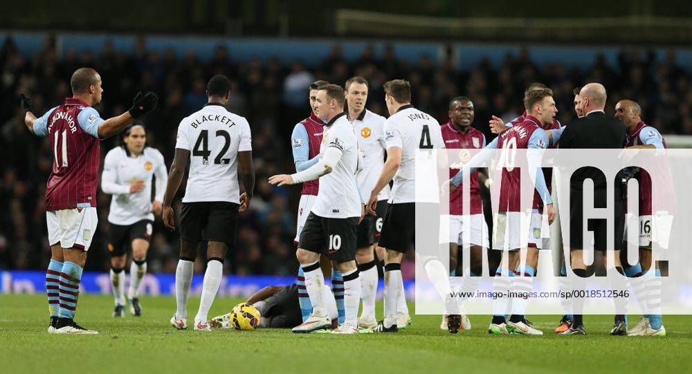 Gabriel Agbonlahor of Aston Villa asks why he has been sent off as Ashley Young of Manchester United ManU lies on the ground - Barclays Premier League - Aston Villa vs Manchester United Villa Park Stadium - Birmingham - England - 20th December 2014 - Picture SimonBellis Sportimage .