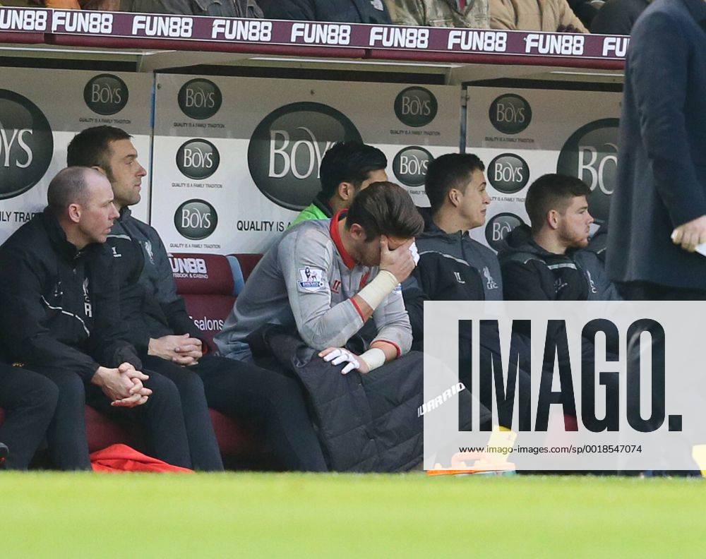 Brad Jones of Liverpool sits on the bench distraught after leaving the game injured - Barclays Premier League - Burnley FC vs FC Liverpool - Turf Moor Stadium - Burnley - England - 26th December 2014 - Picture Simon Bellis Sportimage .