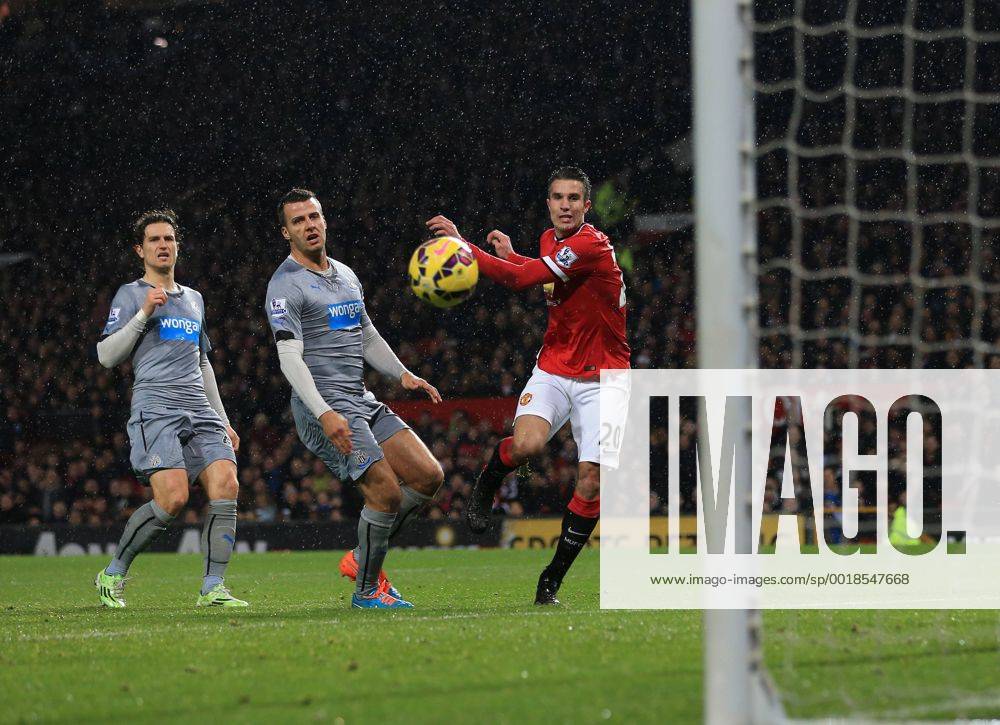 Manchester United ManU s Robin Van Persie scoring his sides third goal Barclays Premier League - Manchester United vs Newcastle United - Old Trafford - England - 26th December 2014 - Picture David Klein Sportimage .
