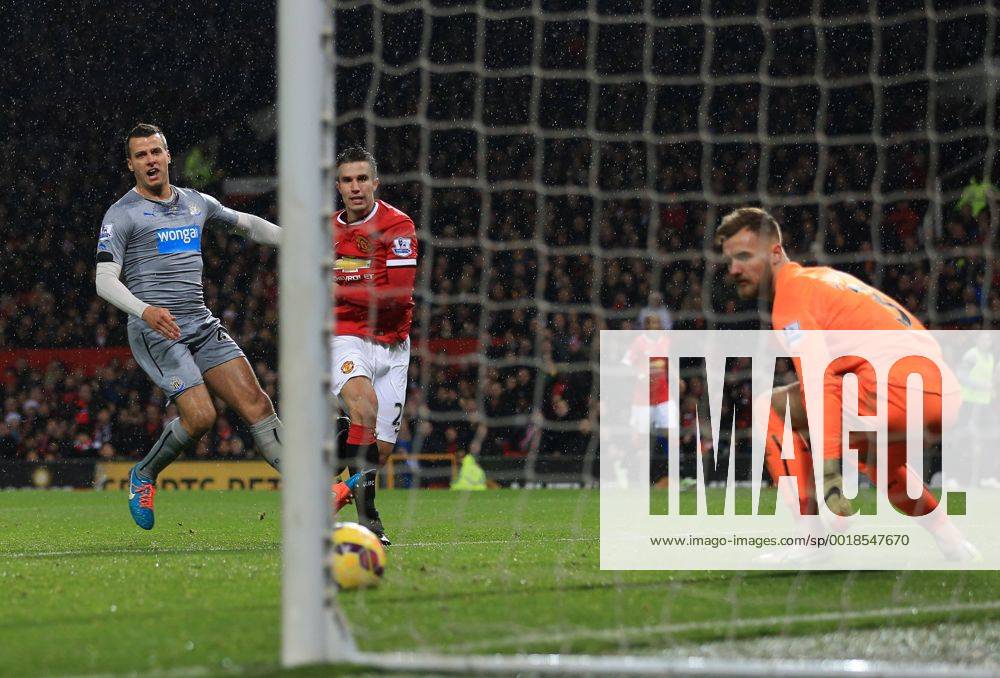 Manchester United ManU s Robin Van Persie scoring his sides third goal Barclays Premier League - Manchester United vs Newcastle United - Old Trafford - England - 26th December 2014 - Picture David Klein Sportimage .