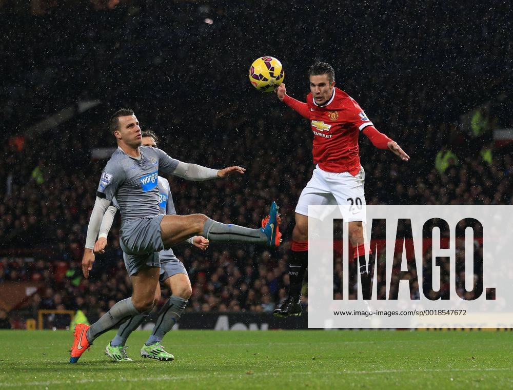 Manchester United ManU s Robin Van Persie scoring his sides third goal Barclays Premier League - Manchester United vs Newcastle United - Old Trafford - England - 26th December 2014 - Picture David Klein Sportimage .