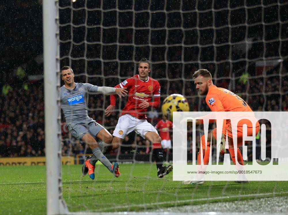 Manchester United ManU s Robin Van Persie scoring his sides third goal Barclays Premier League - Manchester United vs Newcastle United - Old Trafford - England - 26th December 2014 - Picture David Klein Sportimage .